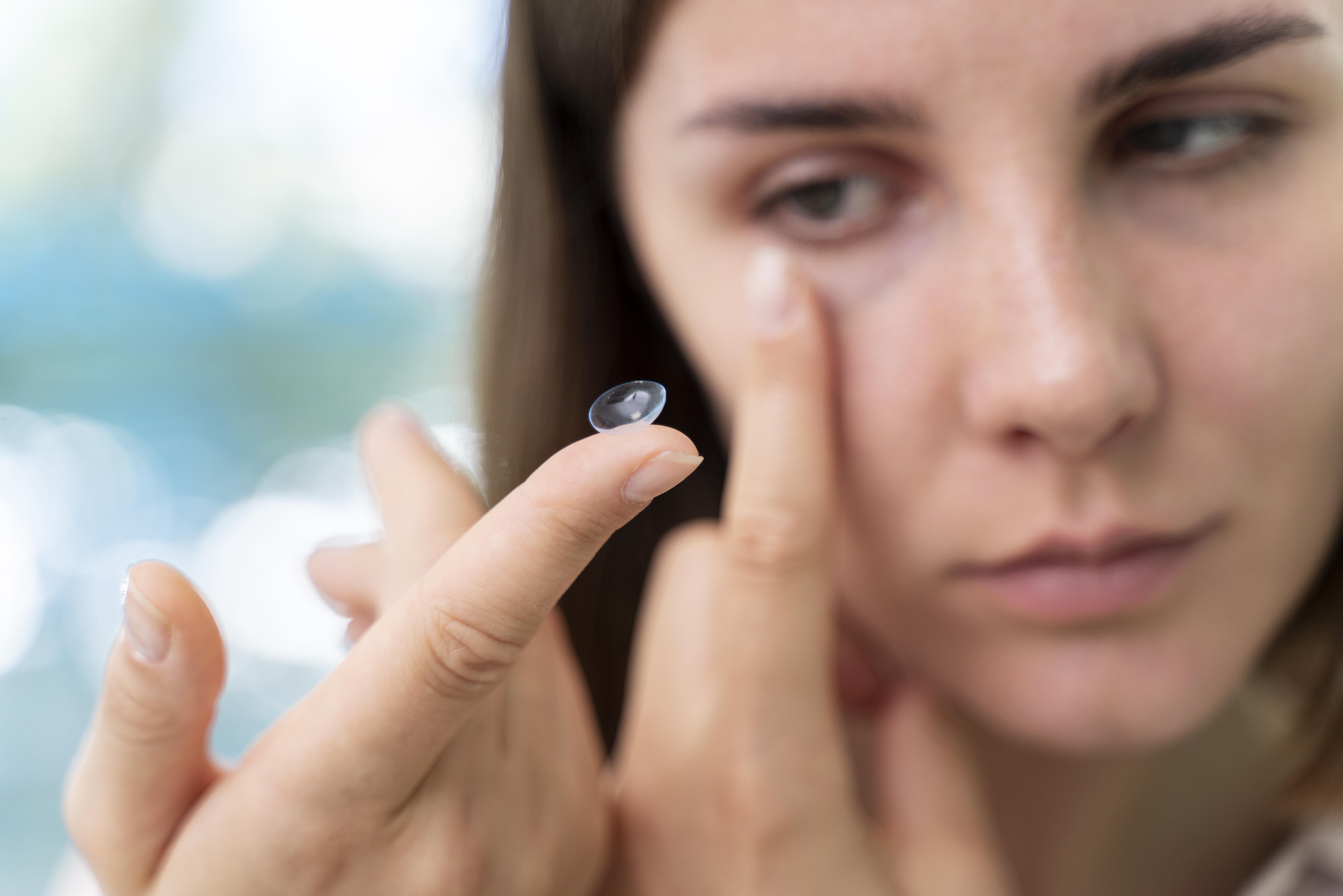 woman-checking-some-new-lenses
